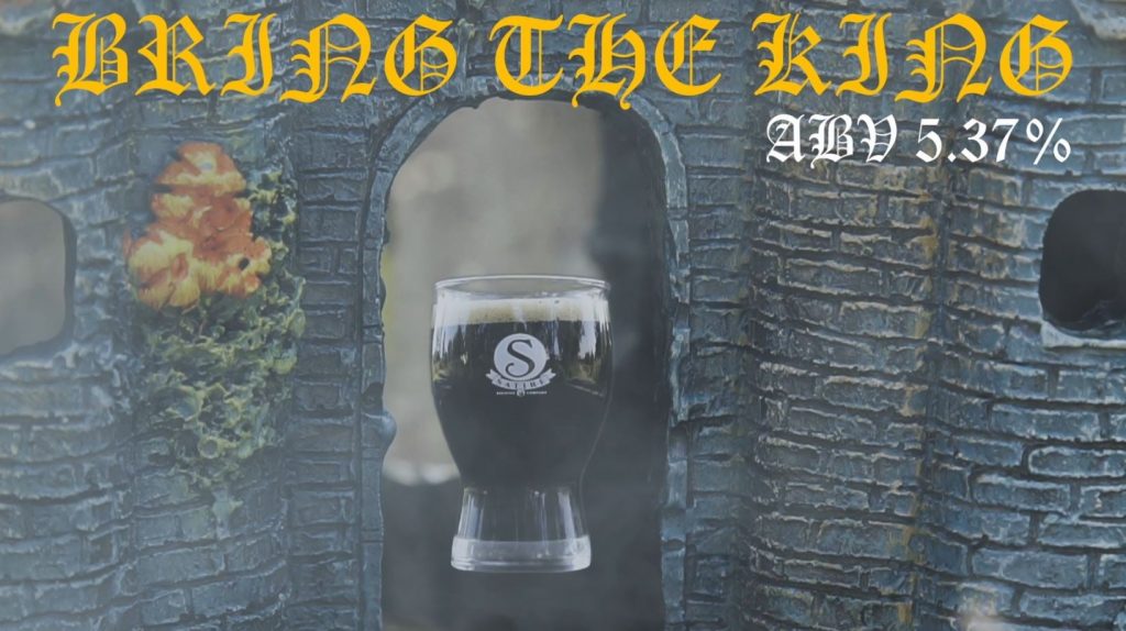 small glass of satire brewing bring the king