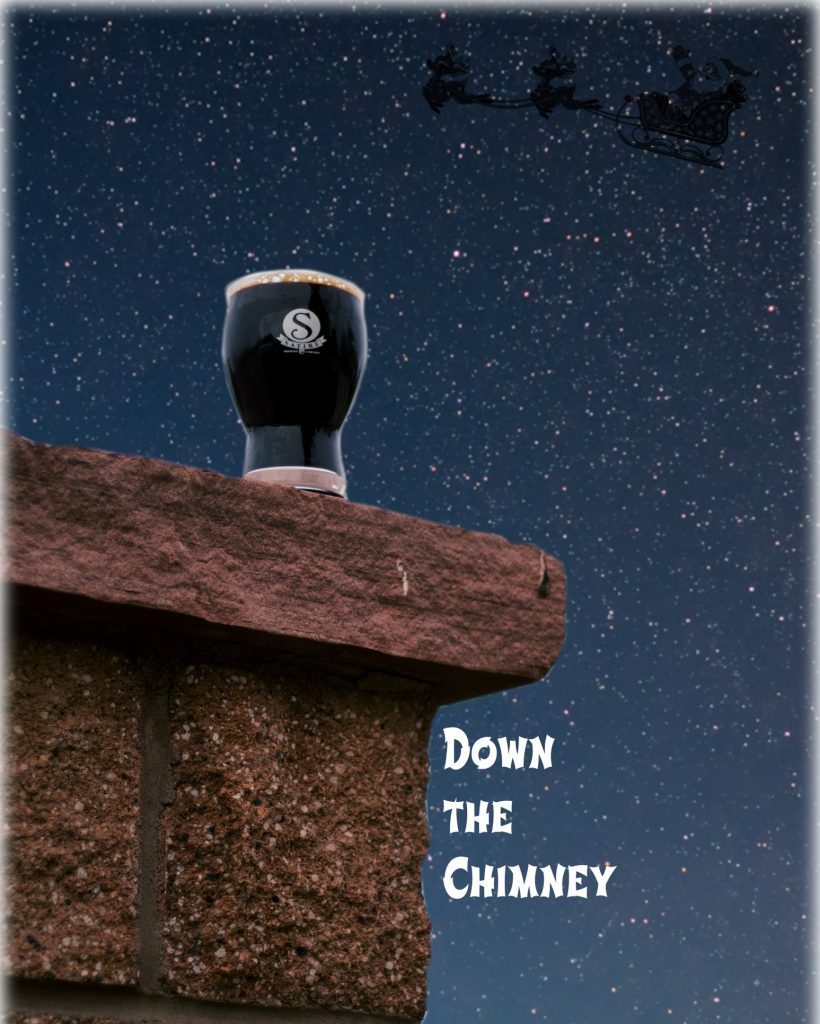 Satire Brewing Company glass of Down the Chimney on cliff with stars