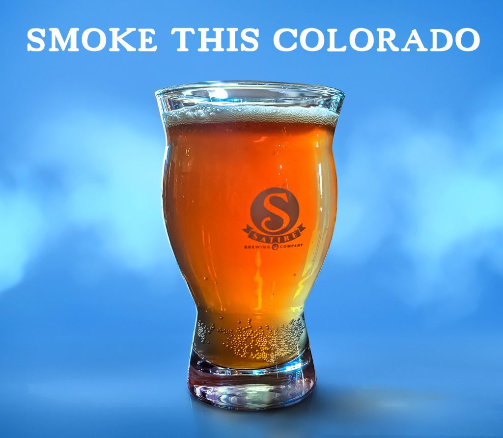 Satire brewing amber ale in pint glass